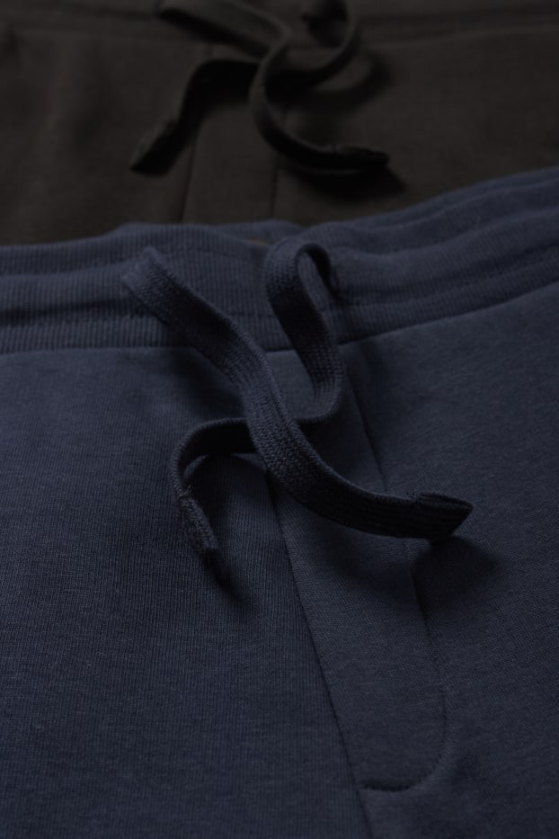 Pánské - Teplákové kalhoty - tmavomodrá