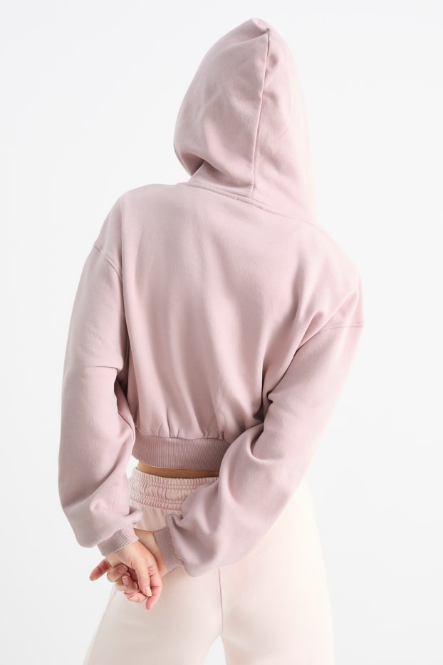 Femmes - Sweat court à capuche - rose