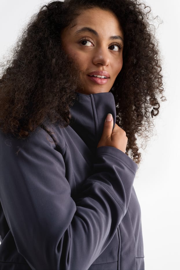 Femmes - Veste à coquille souple avec capuche - finition déperlante - 4 Way Stretch - noir