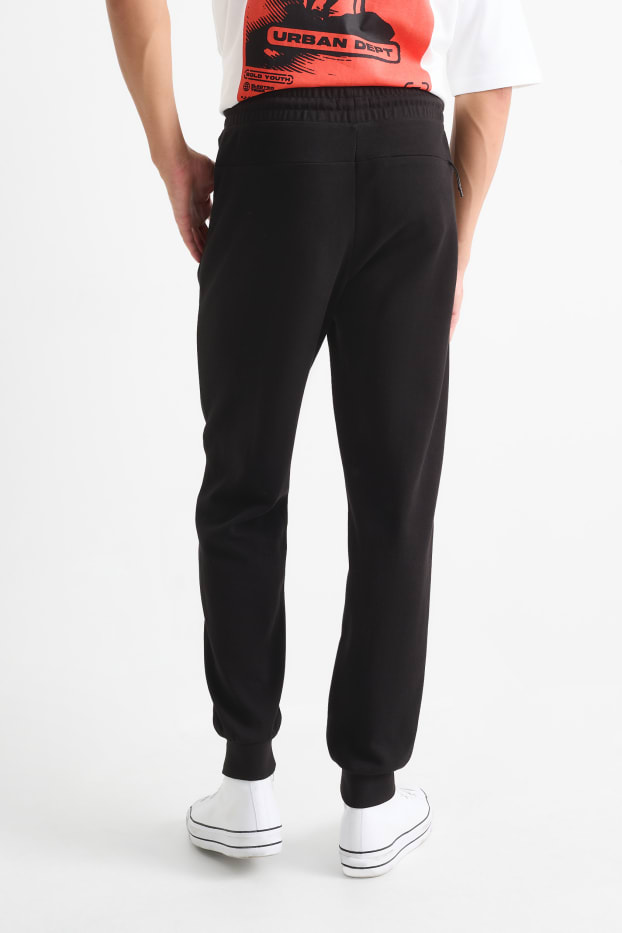 Hommes - Pantalon de jogging - noir