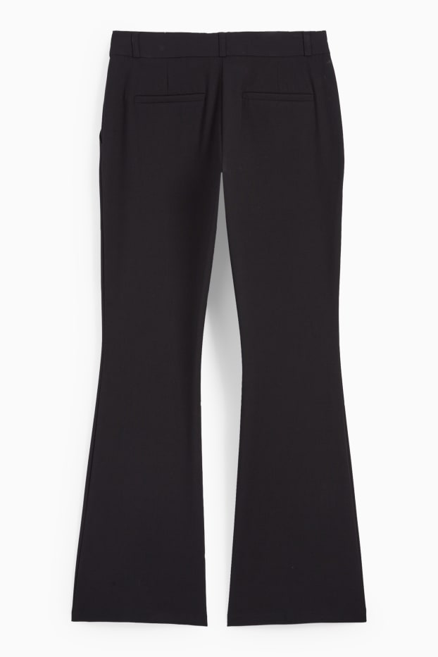 Dona - Pantalons de tela - mid waist - flared fit - negre
