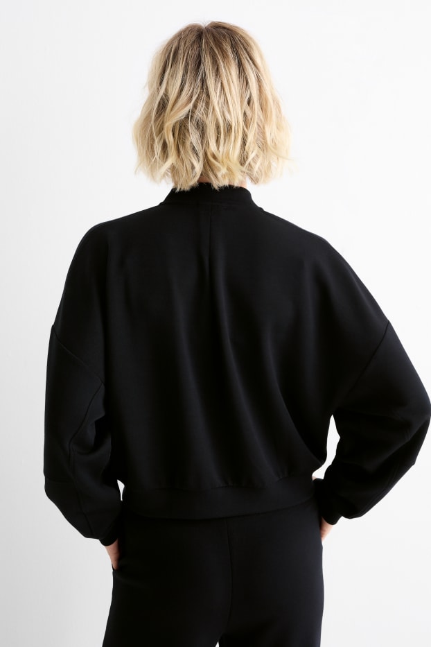 Femmes - Sweat zippé - noir