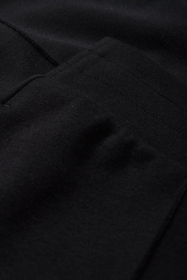 Women - Jersey trousers - high waist - straight fit - black