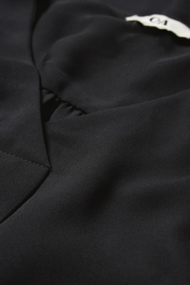 Damen - Bluse mit V-Ausschnitt - schwarz
