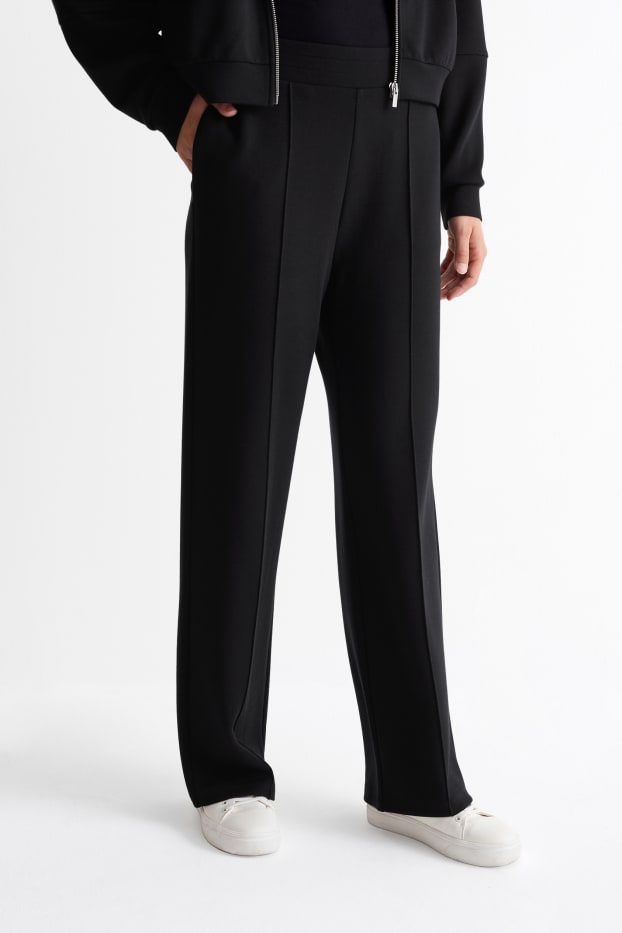 Women - Jersey trousers - high waist - straight fit - black