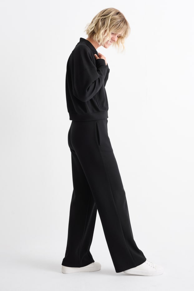 Women - Jersey trousers - high waist - straight fit - black