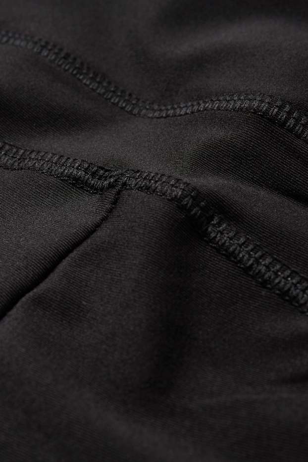 Dámské - Funkční flared legíny - 4 Way Stretch - černá