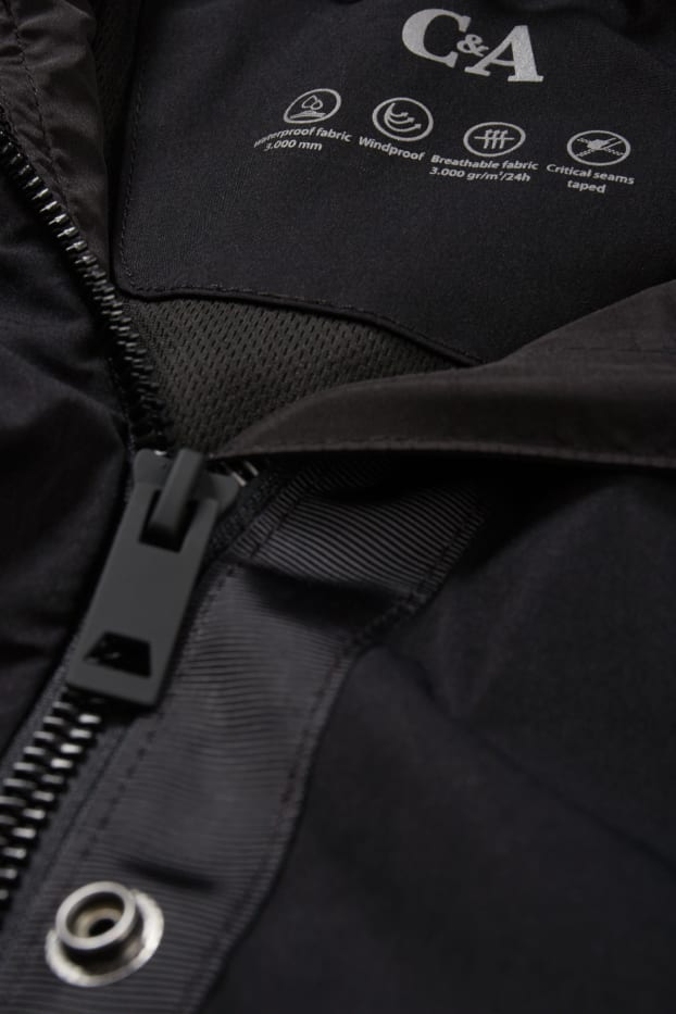 Damen - Regenjacke mit Kapuze - wasserdicht - schwarz