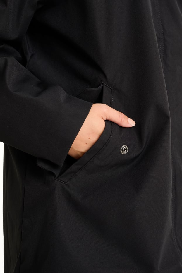 Damen - Regenjacke mit Kapuze - wasserdicht - schwarz