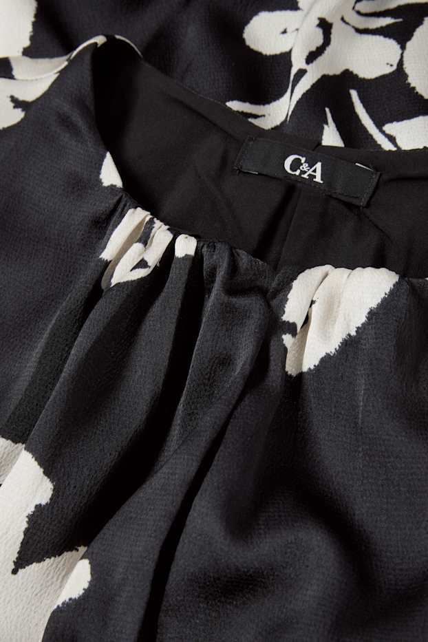 Dona - Vestit acampanat amb mànigues de fanal - de flors - negre