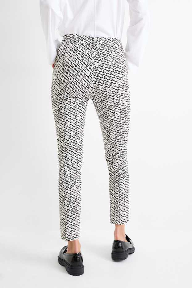 Femmes - Pantalon de toile - mid waist - tapered fit - noir / blanc