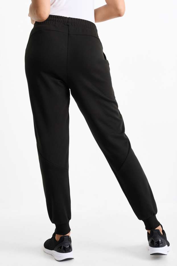 Donna - Pantaloni sportivi tecnici - nero