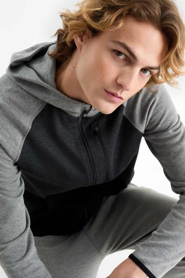 Herren - Funktions-Sweatjacke mit Kapuze - schwarz