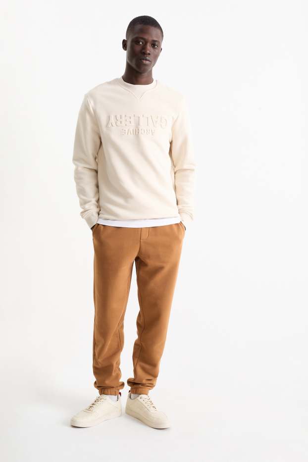 Hommes - Pantalon de jogging - marron