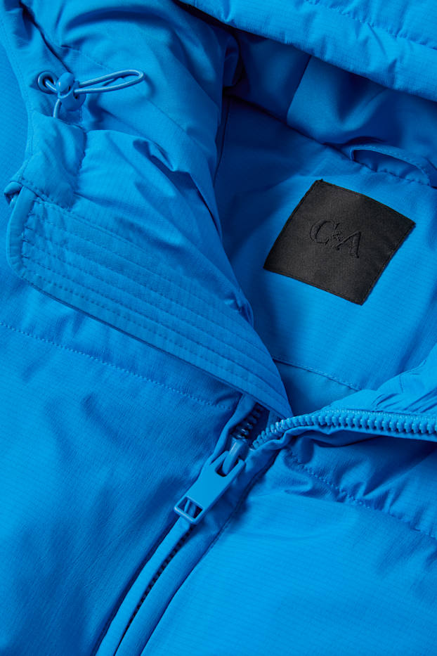 Home - Jaqueta embuatada amb caputxa - blau