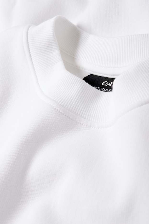 Home - Dessuadora oversized - blanc