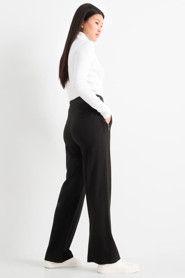 Femei - Pantaloni din jerseu - talie medie - straight fit - negru