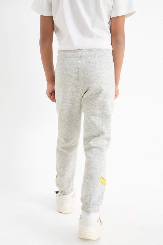 Kinderen: jongens - Pokémon - joggingbroek - licht grijs-mix