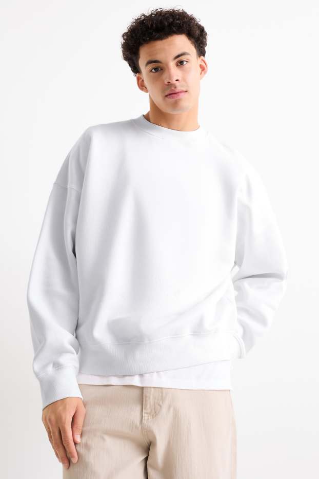 Home - Dessuadora oversized - blanc
