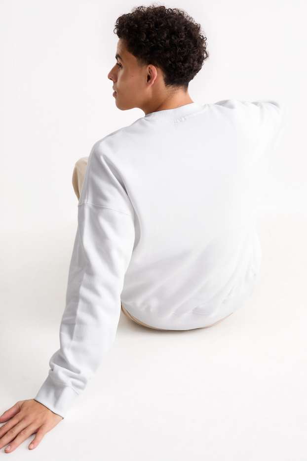 Home - Dessuadora oversized - blanc
