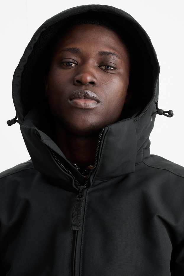 Uomo - Giaccone con cappuccio - idrorepellente - nero