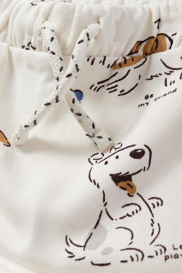 Nadó nen - Gossos - pantalons de xandall per a nadó - blanc