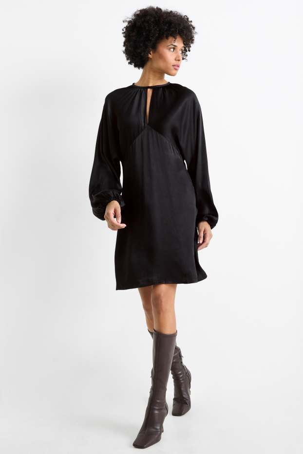Femmes - Robe empire en satin, à manches ballons et dotée d'une découpe - noir
