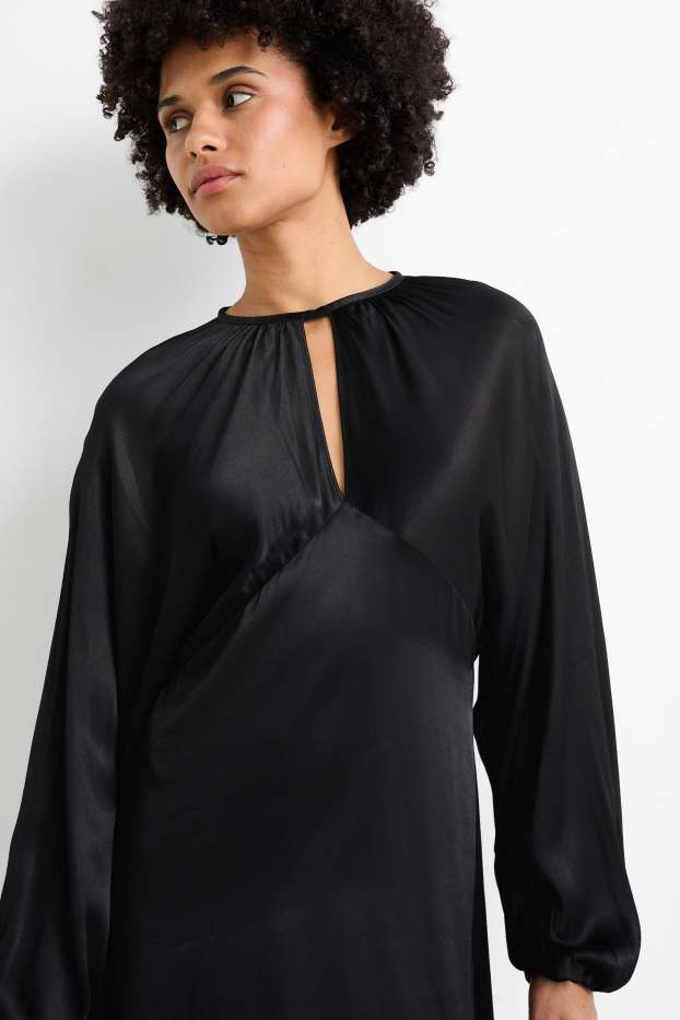 Femmes - Robe empire en satin, à manches ballons et dotée d'une découpe - noir