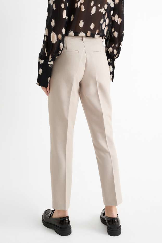 Donna - Pantaloni di stoffa - vita media - tapered fit - beige chiaro