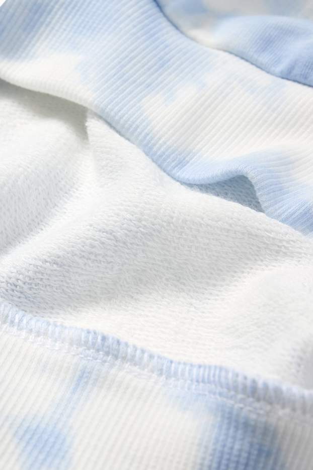 Nena - Lilo & Stitch - conjunt - dessuadora amb caputxa i pantalons de xandall - 2 peces - blanc / blau clar
