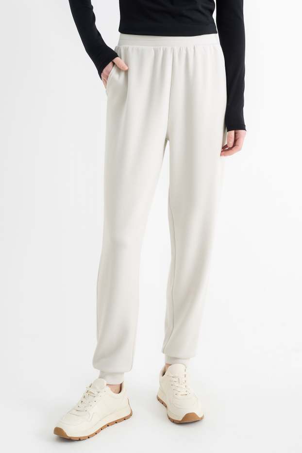 Dona - Pantalons de xandall  - gris clar