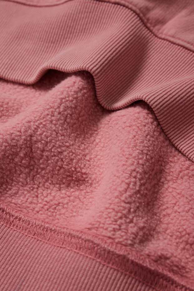 Home - Dessuadora oversized - rosa fosc