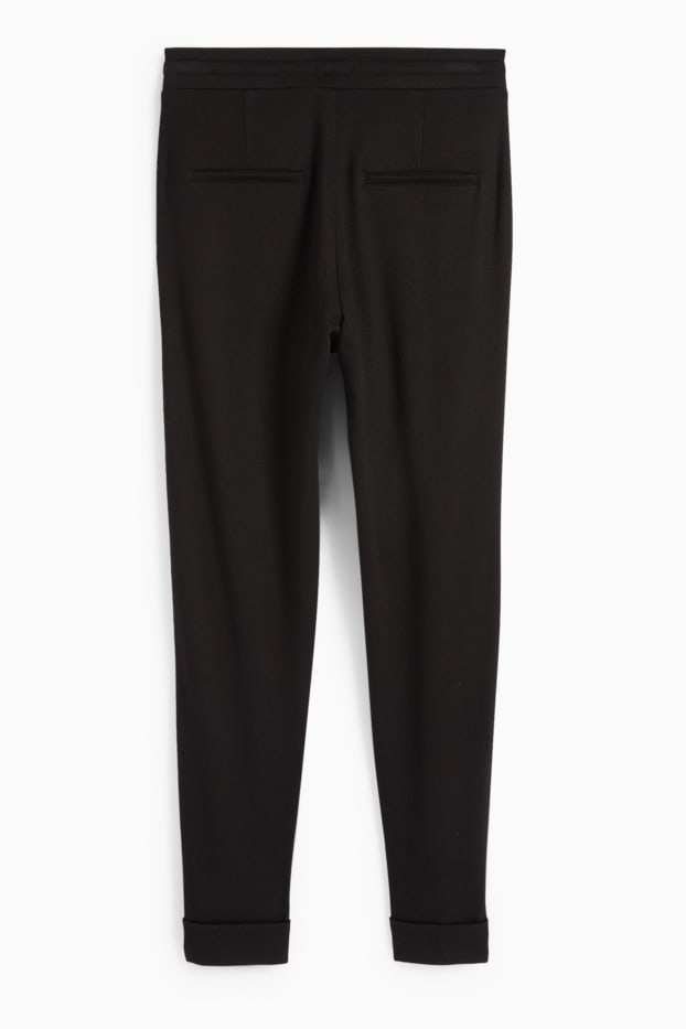 Kobiety - Spodnie z dżerseju - średni stan - tapered fit - czarny
