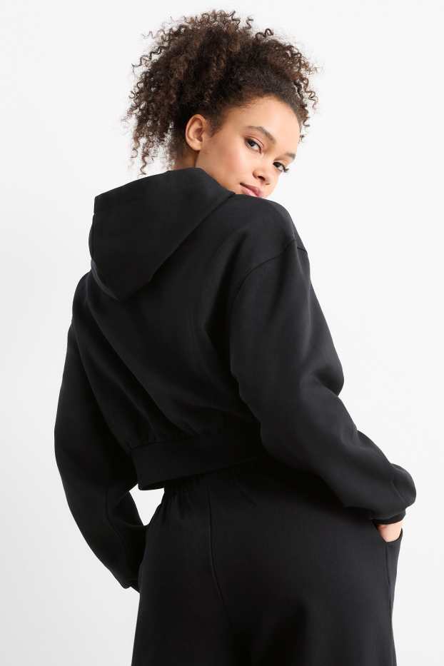Femmes - Sweat court à capuche - noir
