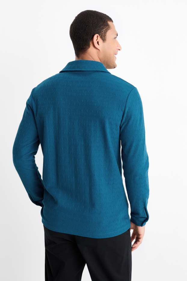 Hommes - Polo - texturé - bleu pétrole