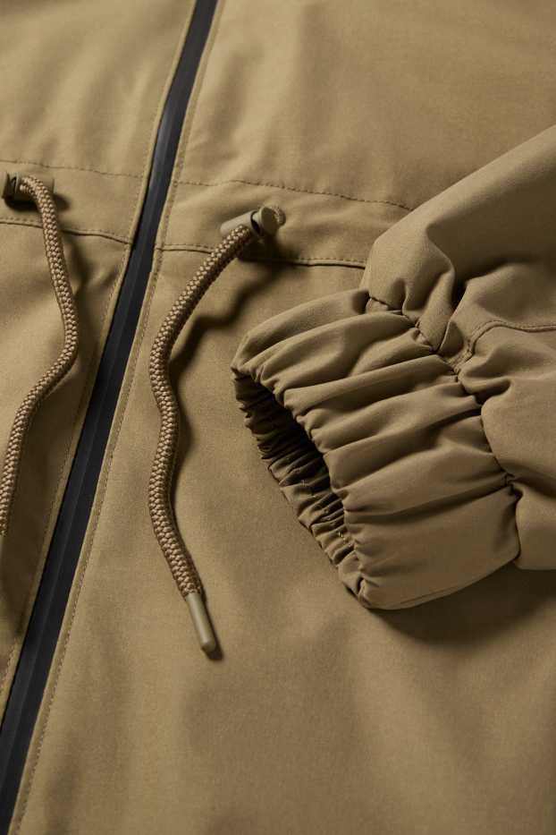 Femmes - Veste de pluie à capuche - imperméable - vert foncé
