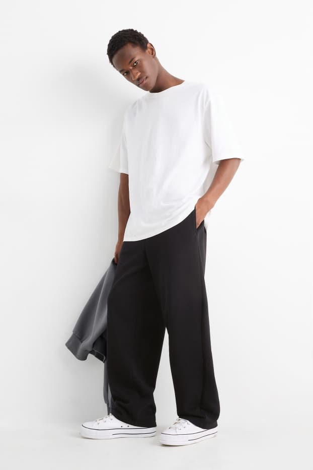 Bărbați - Pantaloni de trening - negru