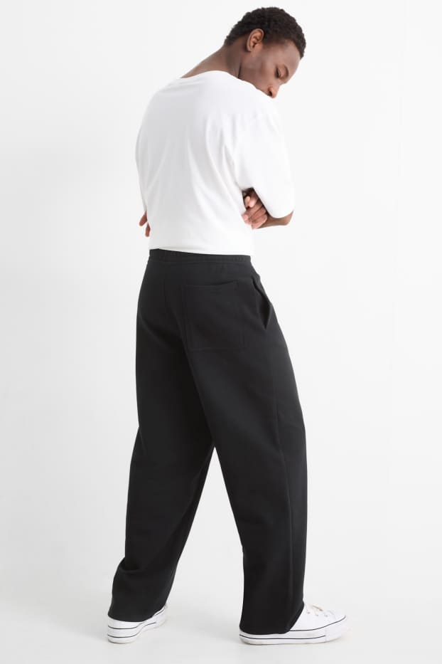 Bărbați - Pantaloni de trening - negru