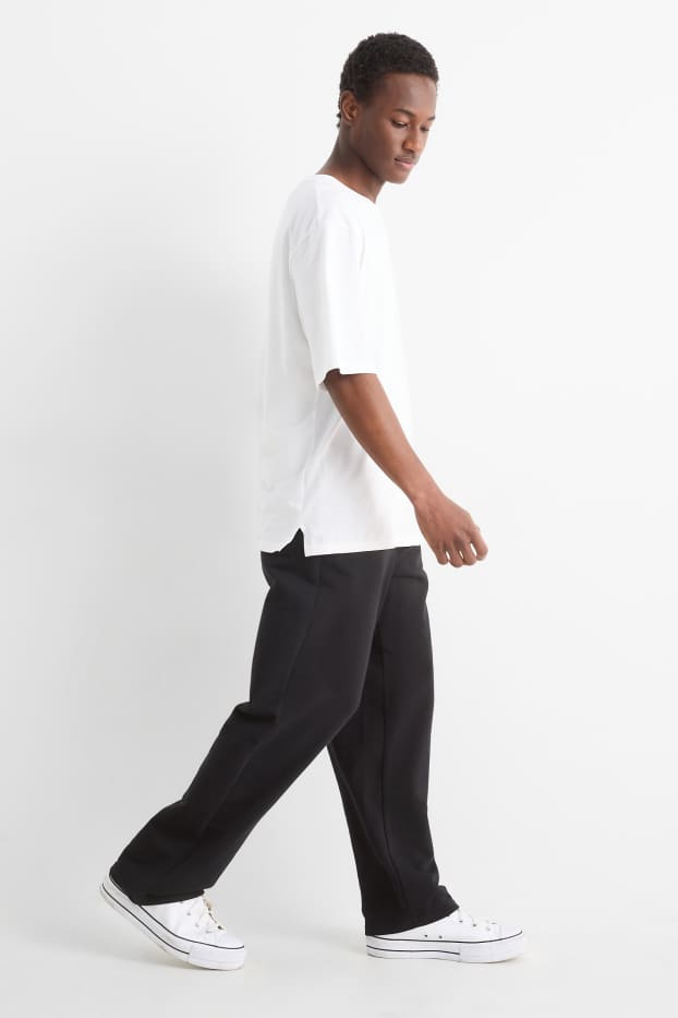 Bărbați - Pantaloni de trening - negru