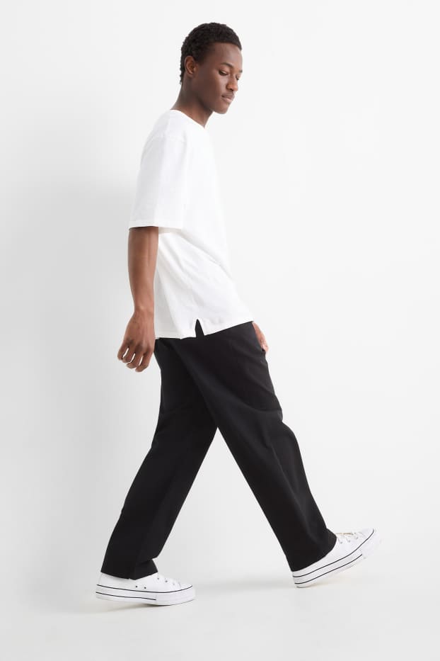 Uomo - Pantaloni chino - relaxed fit - nero