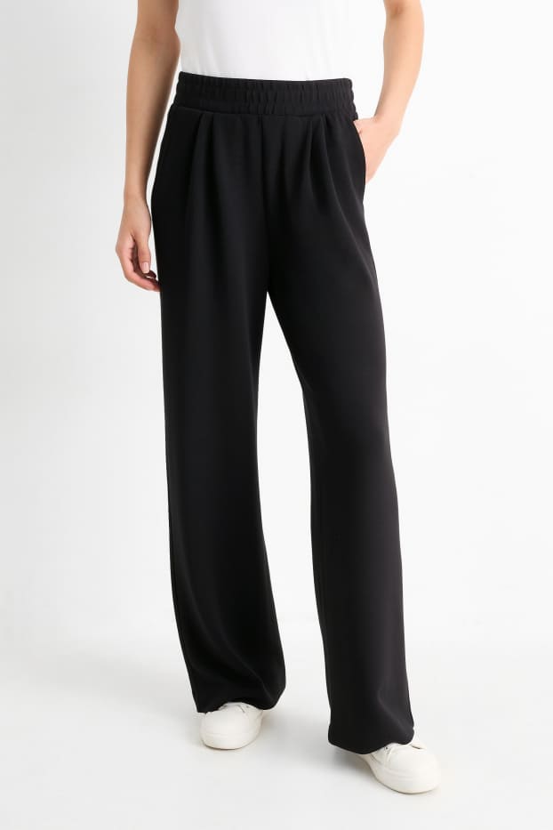 Dona - Pantalons de punt - mid waist - straight fit - negre