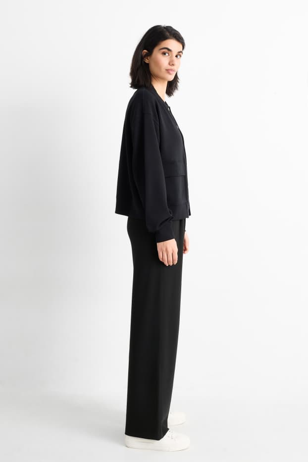Dona - Pantalons de punt - mid waist - straight fit - negre