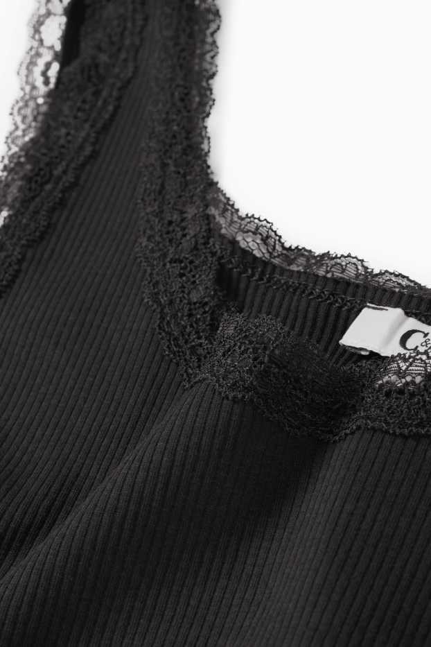 Dona - Samarreta sense mànigues crop - de canalé - negre