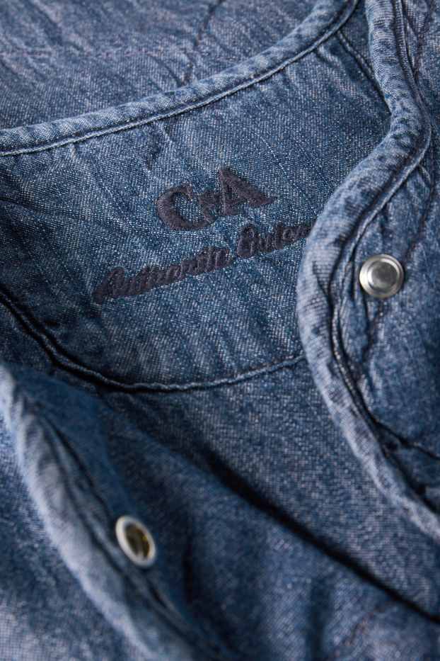 Dames - Spijkerjas met stiksels - donkerblauw