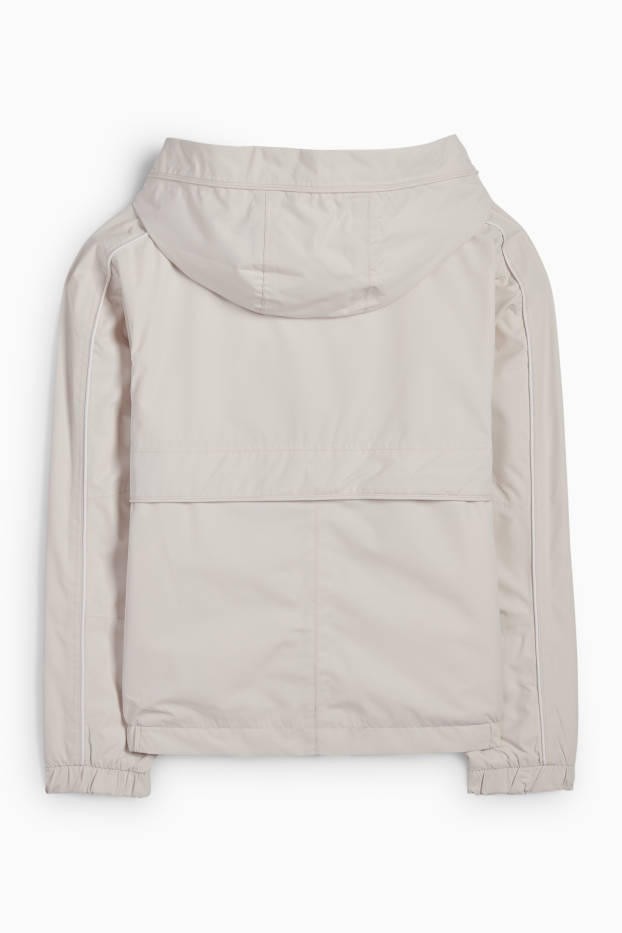 Kinderen: meisjes - Regenjas met capuchon - waterdicht - licht beige