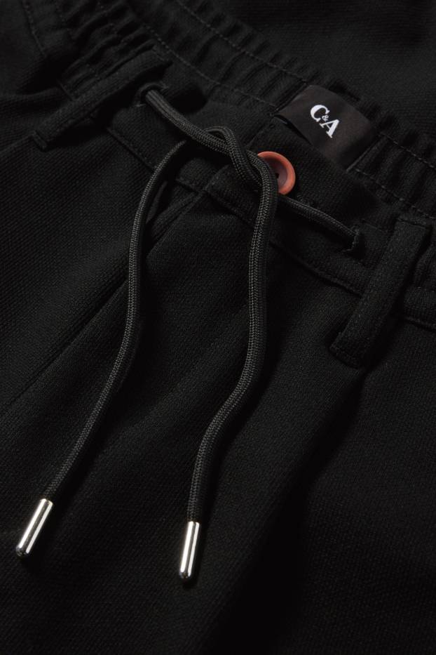 Hommes - Chino - tapered fit - noir