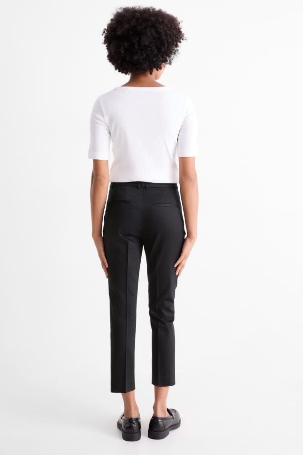Dona - Pantalons de tela - mid waist - tapered fit - negre