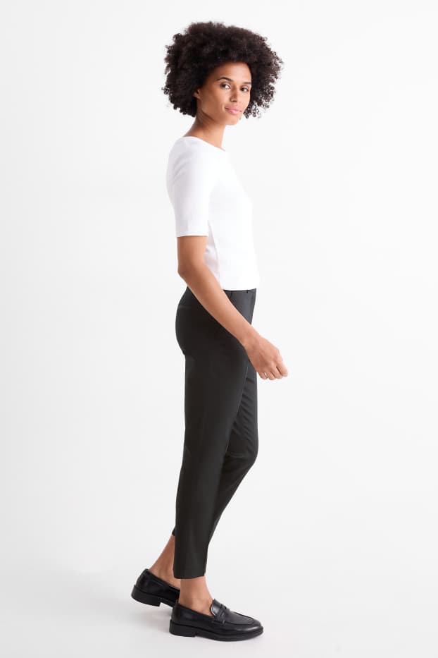 Dona - Pantalons de tela - mid waist - tapered fit - negre