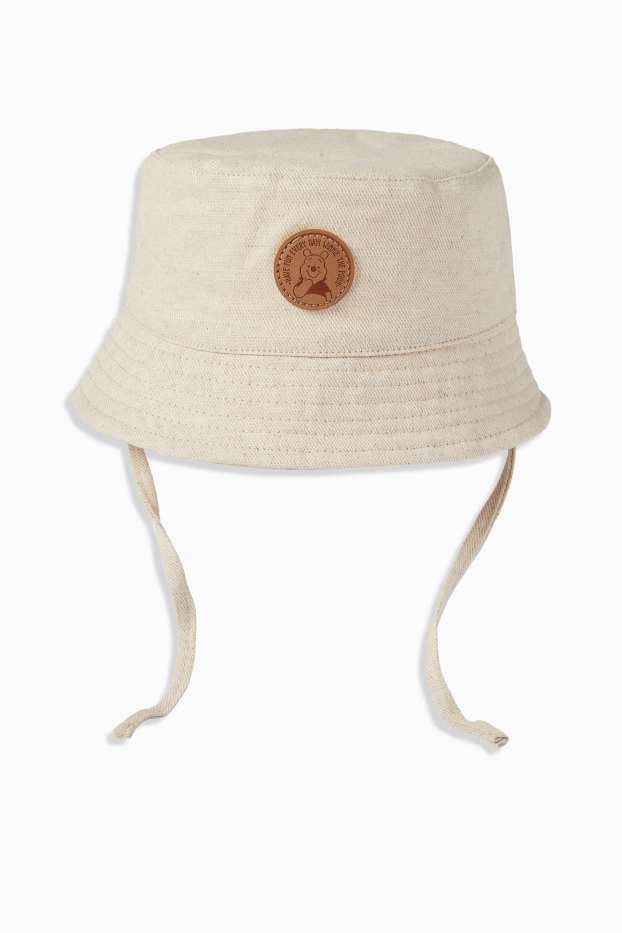 Baby: jongens - Winnie de Poeh - babyhoedje - crème wit