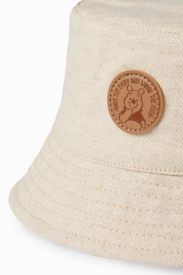 Baby: jongens - Winnie de Poeh - babyhoedje - crème wit